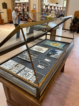 art displayed in an open flat case