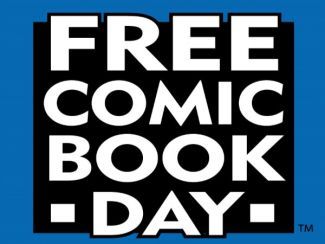 &quot;FREE COMIC BOOK DAY&quot; in bold white letters over a black box over a blue background. 