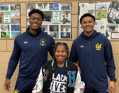 Cal Bears Read student athletes reading to a classroom