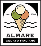 ice cream cone with green red and white scoops on top