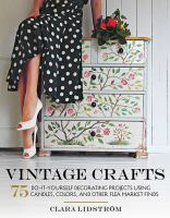 Woman sitting on a hand painted chest of drawers