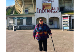 artist standing in front of building on alcatraz island