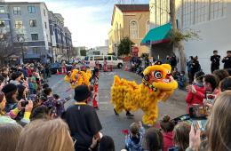Lunar New Year celebration with Lion dancers and people outside