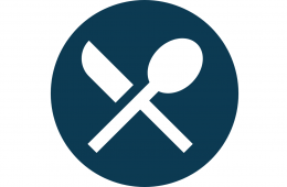 dark blue circle with a silhouette of a white spoon and fork crossed in an x 