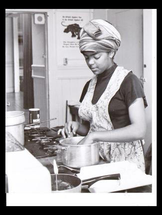 Young woman cooking in a kitchen