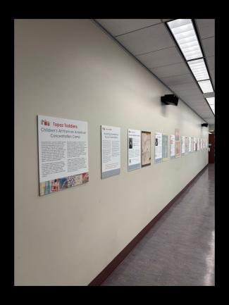 Exhibit posters on a wall