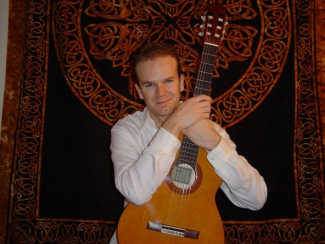 photograph of Chis Waltz with guitar