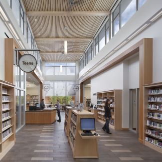 Interior of South Branch. The room is daylight filled and cooled by clerestory windows and ceiling fans