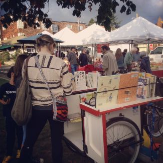 Patrons browsing at the North Berkeley Farmer's Market