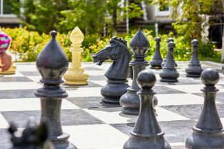 Photo of a chess set outdoors