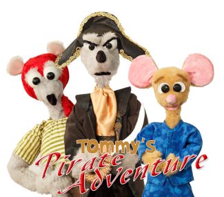 photo of three puppets, one with a red bandana, one with a pirate hat and one with pronounced mouse ears