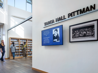 Tarea Hall Pittman South Branch Library Interior photo of signage honoring Tarea Hall Pittman