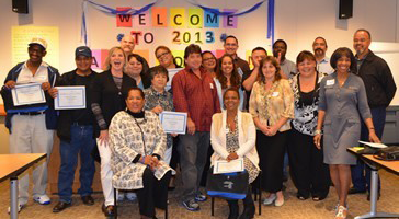 Group photo of literacy tutors and students