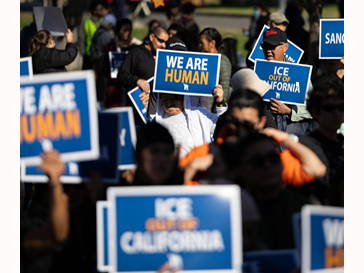 photograph of protesters with signs