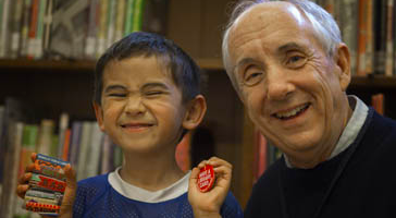 Smiling boy with his first library card