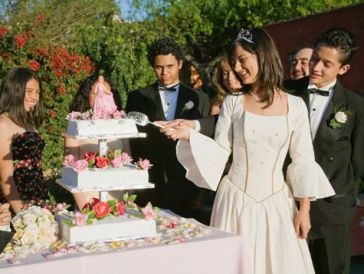 Quinceanera celebrtion cake ceremony