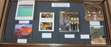Display case showing Notable Berkeley Artists and Authors
