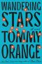 Cover of the book Wandering Stars by Tommy Orange.  Blue Background, black text, orange stars