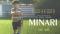 Minari movie poster showing a young boy standign in a field against an American flag background. This film is one of five award-winning films marking Asian American Heritage month at Claremont Branch in May.
